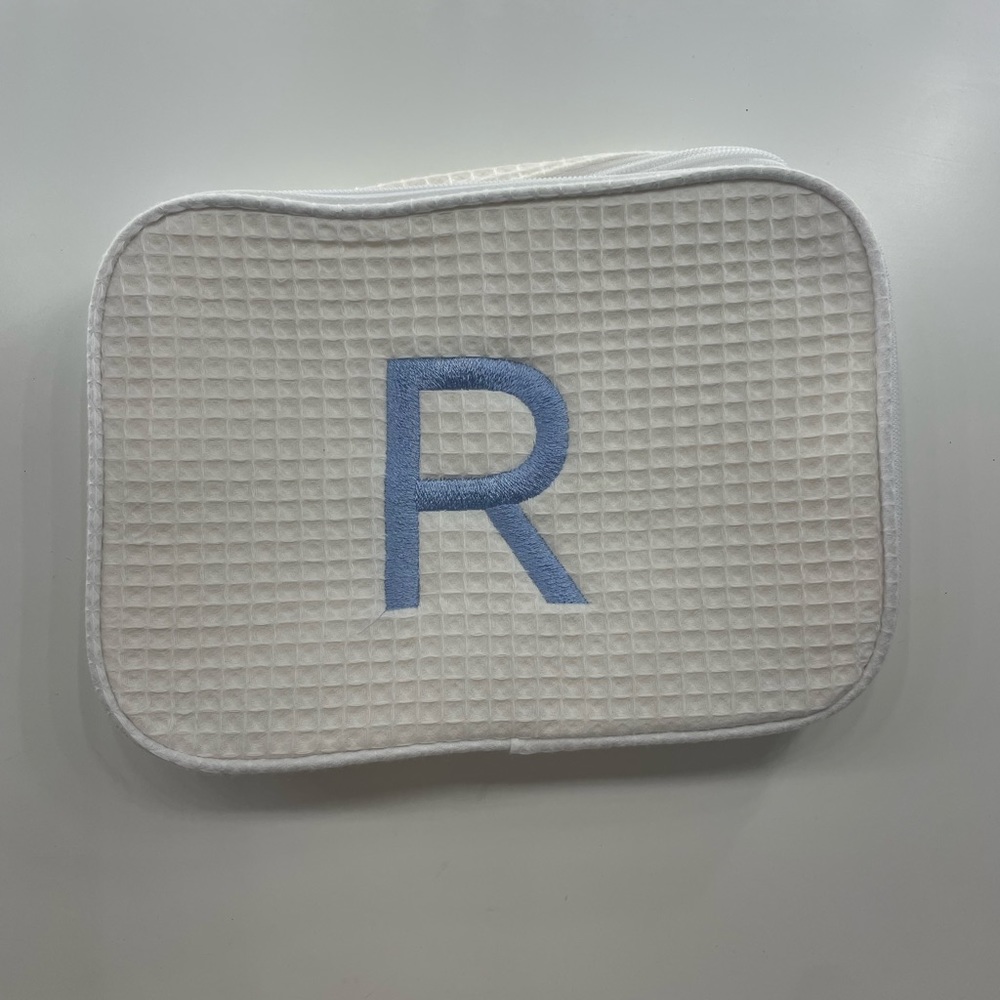 NEW monogrammed “R” cosmetic bag